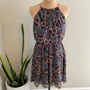 Women’s halter dress size Large. Dark green print